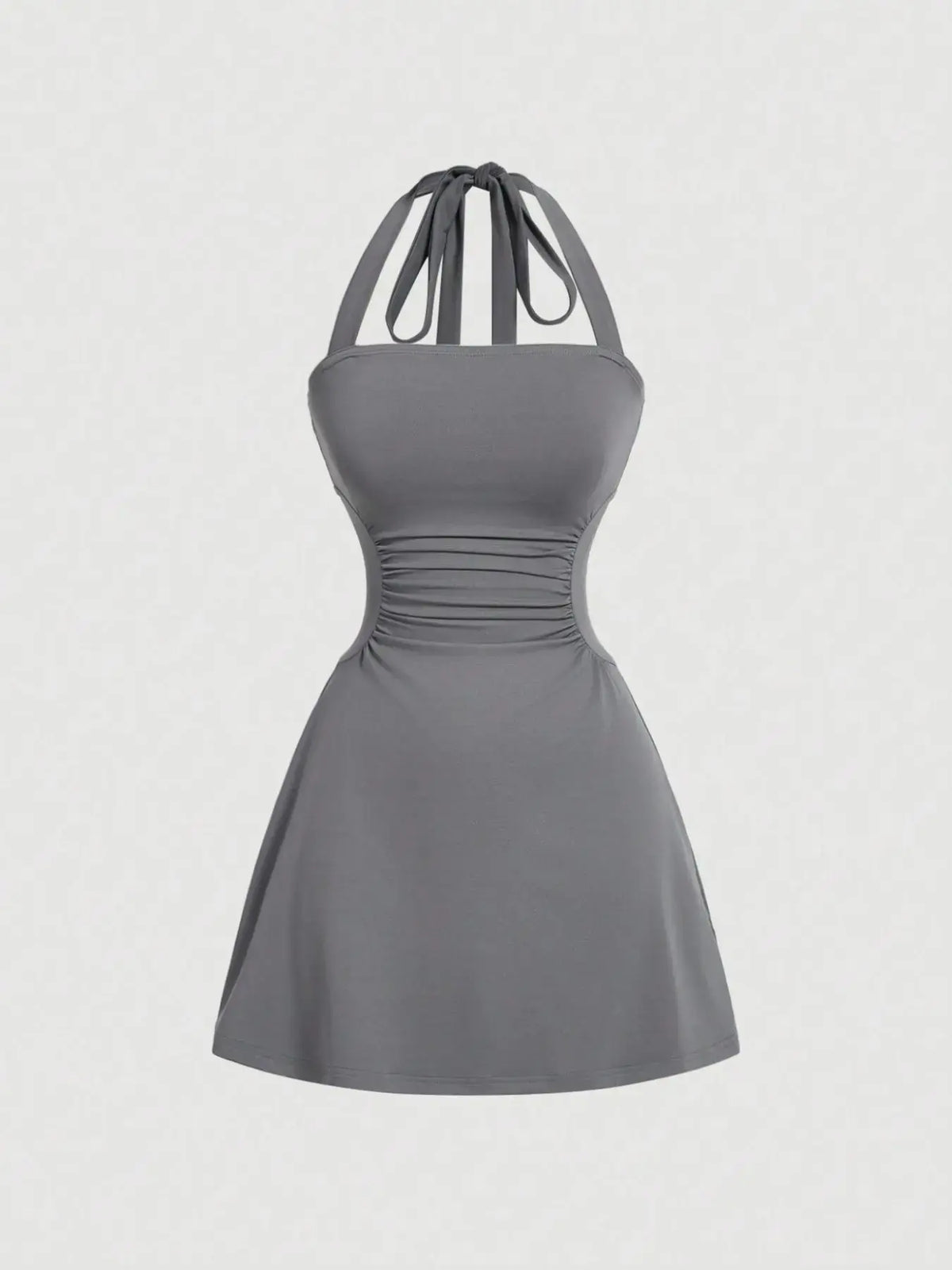 Women's sleeveless polka dot short dress with halter neckline and gathered back